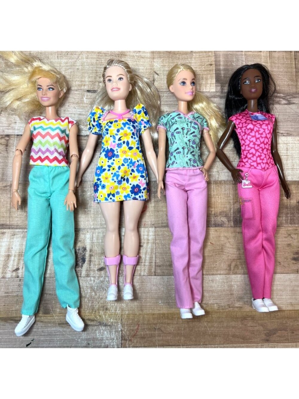 Barbie Dolls Assorted Set Of 4 With Colorful Outfits & Accessories Pre-Owned